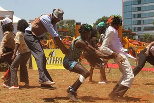 Airborne . . . Members of Iyasa dancing group perform during the commissioning of Zinara earth-moving equipment in Harare yesterday. - (Picture by Innocent Makawa)