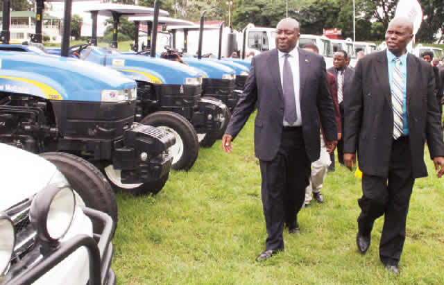 Finance Minister Patrick Chinamasa and his Environment, Water and Climate counterpart Saviour Kasukuwere inspect donations during the handover of sanitation equipment and vehicles by AfDB in Harare yesterday