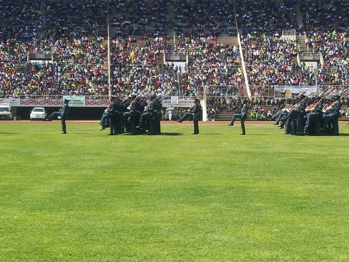 The parade marches at the National Sports Stadium