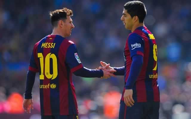 Messi, Suarez propel Barca to La Liga summit