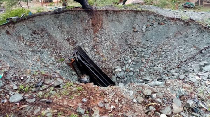 Mine shaft collapse traps five underground