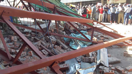 Breaking: City building collapses killing one