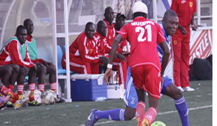 Marshal Mudewe, who completed the game with a heavily bandaged head after colliding with Kadzola