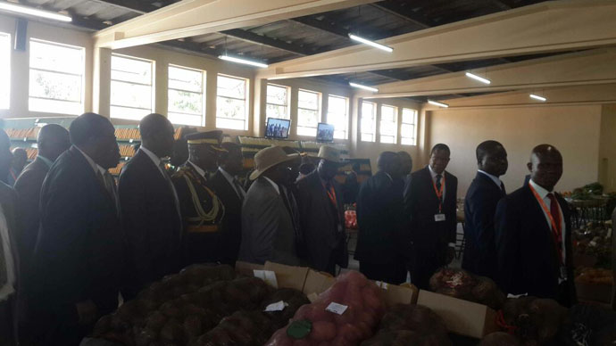 President Mugabe touring the small scale farmers stand. Picture by Tendai Mugabe