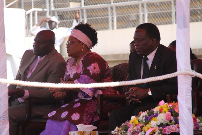 VP Mujuru flanked by DPM Mutambara (left) and Minister of Defence Emmerson Mnangagwa attend the Defence Forces Day