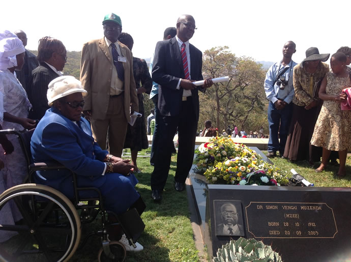 Late VP Muzenda's widow, Maud and family at his grave