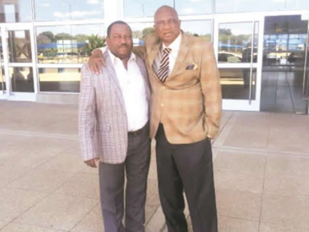 BROTHERS IN ARMS . . . Omega Sibanda (left) poses for a picture with Philip Chiyangwa after the duo’s meeting in Bulawayo yesterday