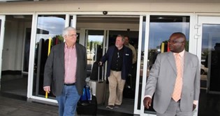 Zimbabwe National Chamber of Commerce deputy president Mr Davison Norupiri (right) welcomes head of delegation for the visiting  members of the European Parliament Dr Mario David and his team at the Harare International Airport yesterday 