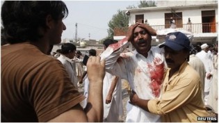 A man distraught outside the church Islamists have been blamed for attacks on Christians in the past