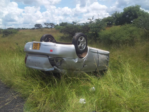 The Toyota Platz landed on its roof.