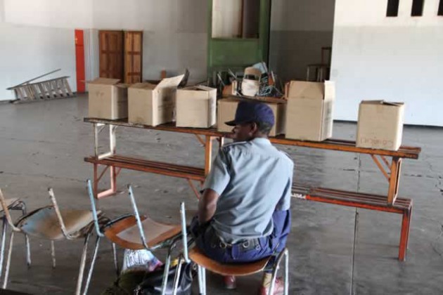 Police guards ballot boxes at Unit L Hall. - (Pic by Tawanda Mudimu).