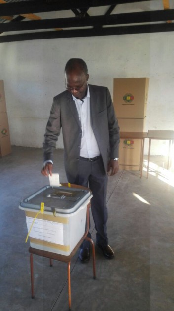 Zanu-PF candidate for Tsholotsho North Professor Moyo casts his ballot at Mlevu Primary School.