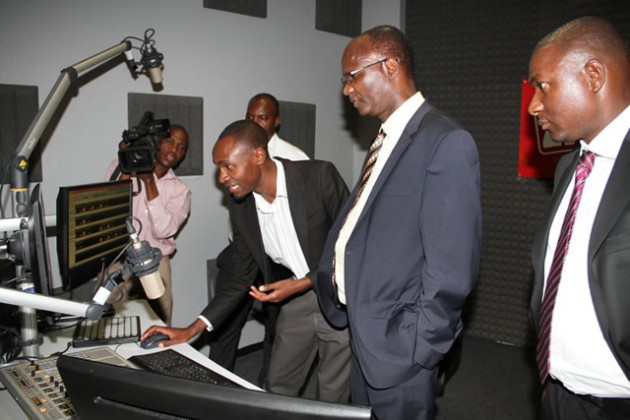 Information, Media and Broadcasting Services Minister Professor Jonathan Moyo (centre) and his deputy Cde Supa Mandiwanzira (right) being shown some of the operations in one of ZiFM Stereo studios by programme manager Antony Makoni yesterday