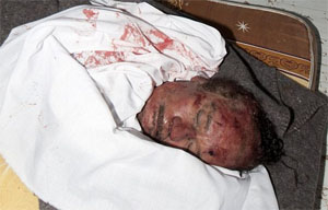 Gaddafi taken deep into desert for secret burial
