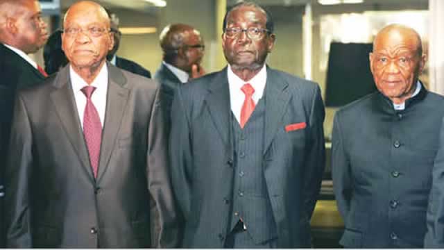 SADC Chairman President Mugabe (centre) and his South African counterpart President Jacob Zuma (left) and Lesotho Prime Minister Thomas Thabane during the Troika Summit in Pretoria, South Africa, yesterday
