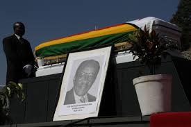 Pallbearers carry the casket bearing the body of the late veteran nationalist and Zanu-PF Politburo member Cde Nathan Shamuyarira at the National Heroes Acre yesterday