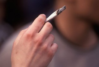 New ban: Smoking ban is set to be introduced in prisons across the country after staff complained they were being forced to breathe in the second-hand smoke of inmates