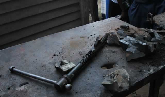 What remained of the explosion: The table where Moses Mudefi died whilst trying to open a bomb.