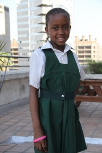 The pupil . . . Tanya in her school uniform