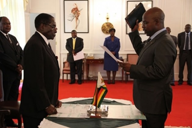 President Mugabe swears in former Attorney-General Mr Johannes Tomana as Zimbabwe’s first Prosecutor-General of the National Prosecuting Authority at State House in Harare yesterday