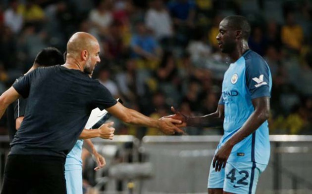 Manchester City midfielder Yaya Toure (right) continues to face an uncertain future after he was left out of the squad to face Steaua Bucharest tonight