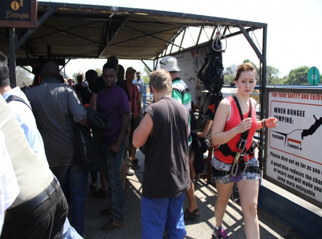 tourits at Victoria Falls Bridge 