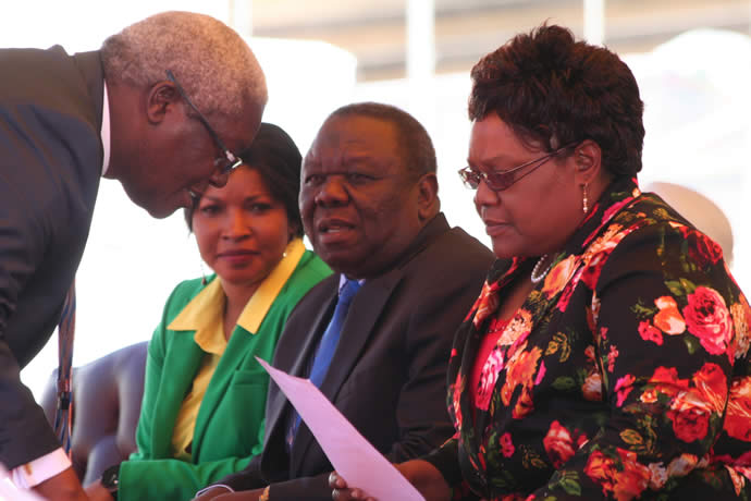 VP Mujuru and PM Tsvangirai discuss with Minister of Local Governmnet, Rural and Urban development Ignatius Chombo while the PM's wife Elizabeth Macheka looks on
