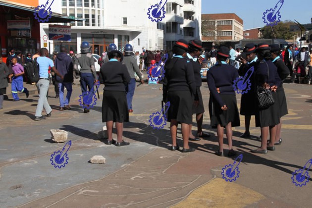 Police and their Municipal counterparts restore order. All pictures by Innocent Makawa