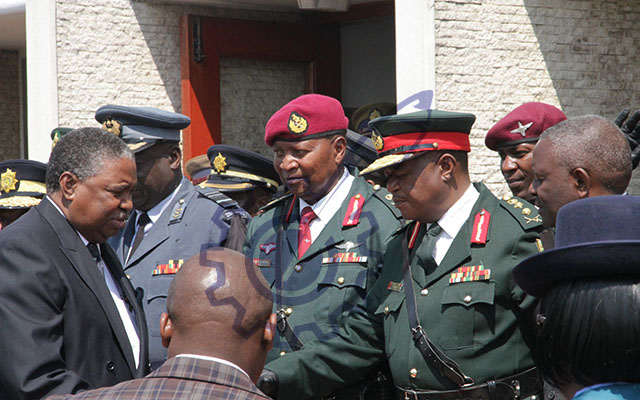 Vice President Phelekezela Mphoko greets the service chiefs at Stodart Hall in Mbare