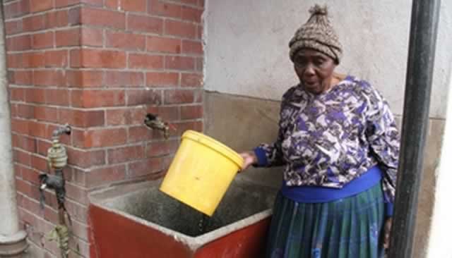 Mrs Mary Munetsi (81) of Highfield, Harare, wakes up to a dry tap after Harare City Council disconnected water supply at her house for non-payment of the water bill yesterday. The High Court recently ruled that municipalities must not disconnect supplies without a court order. —(Picture by William Mafunga)