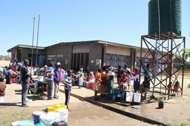 Glen Norah residents queue for hours to fetch clean water from a borehole at a community centre due to shortages experienced in the suburb recently