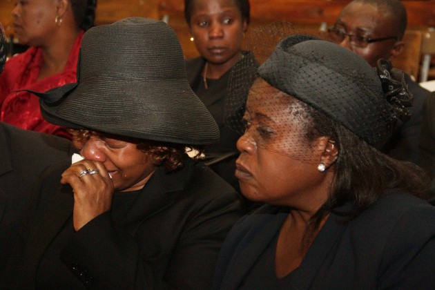 Wife of the late Brig-Gen Misheck Tanyanyiwa sheds tears at the Stodart Hall today