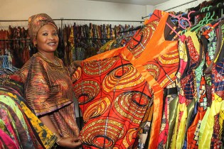MIDAS TOUCH . . .Rose Vambe of Ashava Designs shows off some of the African and ethnic wear that was a hit at just ended UNWTO General Assembly