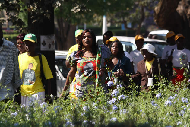 Zanu-PF supporters coming for the opening of parliament in Harare