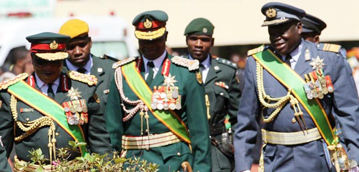 Commander of the Defence Forces, General Constantino Guvheya Nyikadzino Chiwenga (l), National Army Commander Lieutenant-General Philip Valerio Sibanda and Air Force of Zimbabwe Commander Air Marshal Perrence Shiri arrive for the celebrations of the ZDF at the National Sports Stadium Tuesday afternoon.