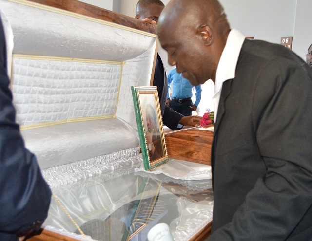 Mr Jabulani Manyathela pays his last respects to his late son Adrian who died in Ukraine under mysterious circumstances during a Church service at Famona’s UCCSA church yesterday