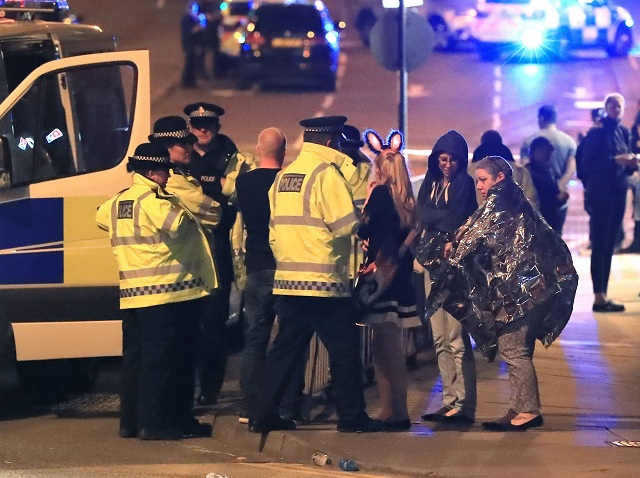 Emergency services at Manchester Arena after reports of an explosion at the venue during an Ariana Grande gig — PA