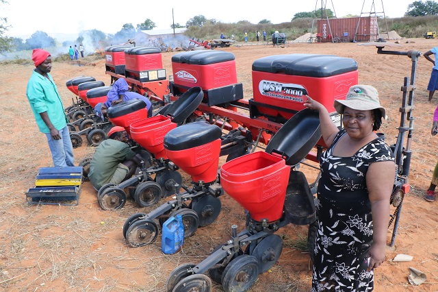 Bulawayo Kraal Irrigation Scheme chairperson Mrs Veronica Munkuli shows a planter which is one of the equipment that is already on site for the planting of winter crop in Binga on Tuesday. (Picture by Eliah Saushoma)