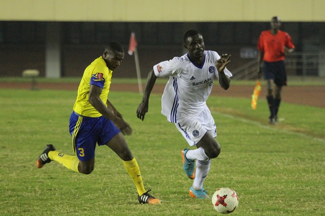 INDOMITABLE LION ON THE LOOSE. . . Dynamos’ Cameroonian striker Christian Epoupa Ntouba (right) streaks clear of his marker during the Castle Lager Premiership match at the National Sports Stadium last night. — Picture by Kudakwashe Hunda