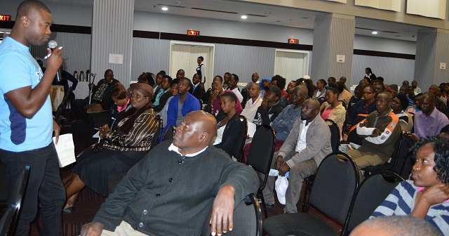 Econet representative Gilbert Tsongorera (left) conducts a business workshop with his company’s agents at a local hotel yesterday