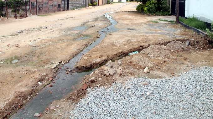 Sewage flows in Gwabalanda homes, streets