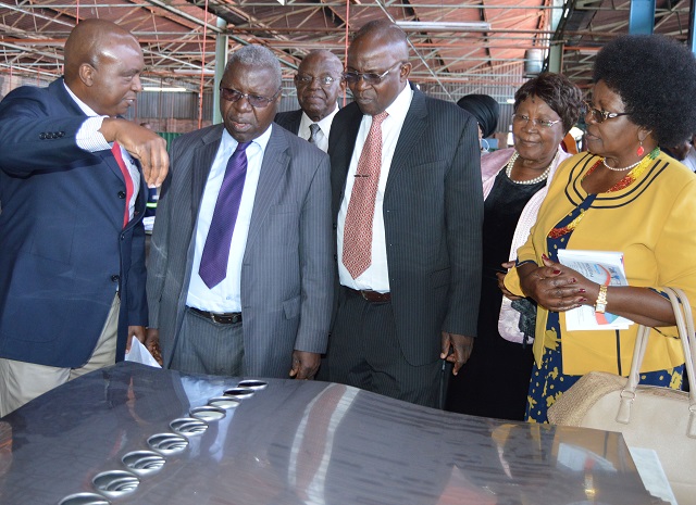 Monarch Steel Managing Director Mr Fritzpatrick Mawovera (left) explains to the Permanent Secretary in the Ministry of Energy and Power Development Cde Partson Mbiriri, next to him, on the material used in making solar geysers while, from right, the Minister of Small to Medium Enterprises and Co-operative Development Cde Sithembiso Nyoni, Bulawayo Province Minister of State Cde Nomthandazo Eunice Moyo and Bulawayo Mayor Councillor Martin Moyo listen during the commissioning of the solar geysers plant at Monarch Steel factory yesterday