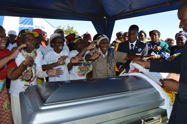 Zanu-PF women’s league members ululate in praise of the late national hero Cde Naison Kutshwekhaya Ndlovu when his body was lying in state at his homestead at Gwatemba rural area in Insiza district yesterday. — Picture by Dennis Mudzamiri..