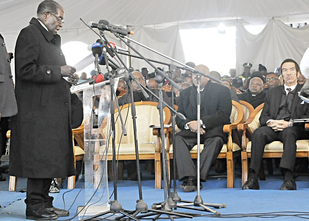 President Mugabe addresses mourners at the burial of former Botswana President Sir Ketumile Masire in Kanye, Botswana, yesterday. — (Picture by Presidential Photographer Joseph Nyadzayo)