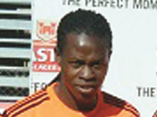 Footie star beats man over debt