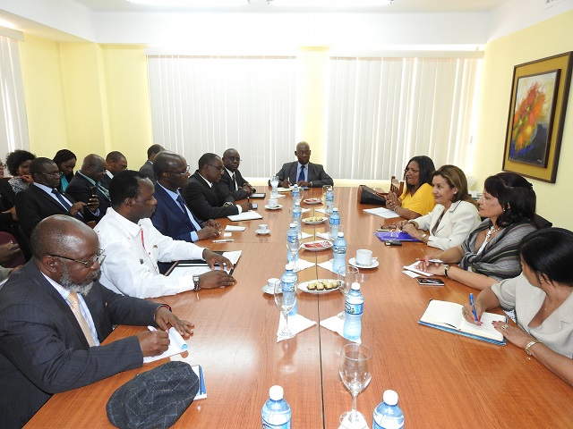 Cuban Minister of Science , Technology and Environment , Cde Elba Rosa Perez Montoya (in cream) stresses a point during a meeting with the Zimbabwe delegation led by Higher and Tertiary Education , Science and Technology Development Minister Professor Jonathan Moyo (navy suit) while other officials follow proceedings.
