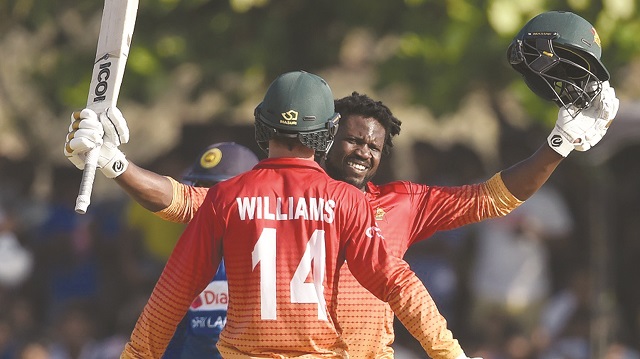 Zim win in record chase