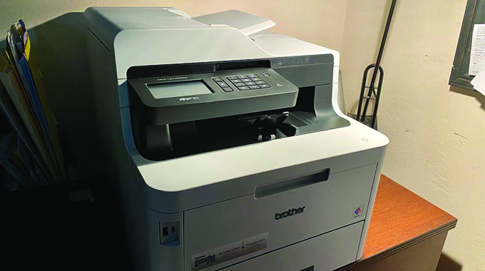 Church donates printer to Mpilo