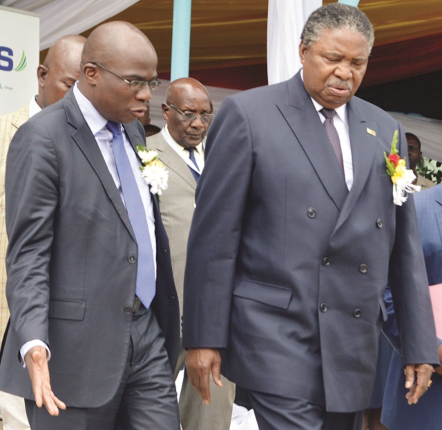 Vice President Phelekezela Mphoko (right)
