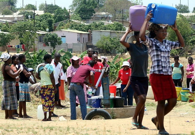 Bulawayo residents fetch water from a borehole in this file photo